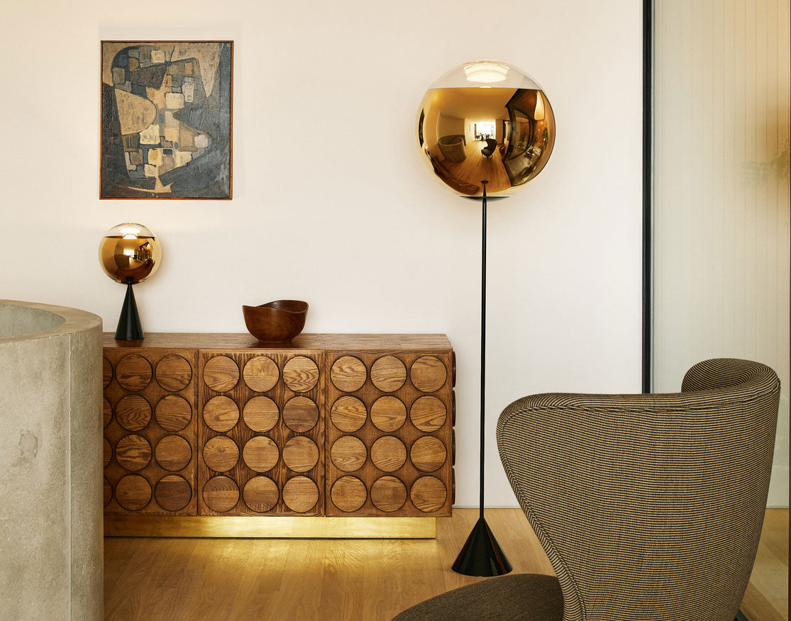 Tom Dixon table lighting in an official gold interior composition