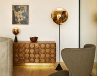 Tom Dixon table lighting in an official gold interior composition