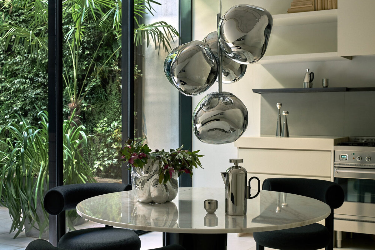 Tom Dixon Melt Mini Chandelier in silver in an official lifestyle view