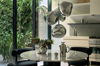 Tom Dixon Melt Mini Chandelier in silver in an official lifestyle view