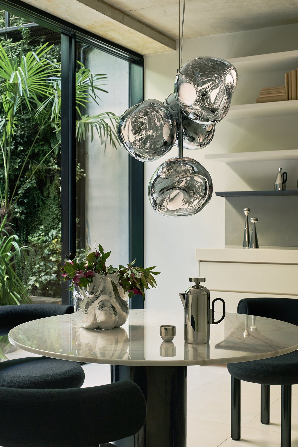 Tom Dixon Melt Mini Chandelier in silver in an official interior detail