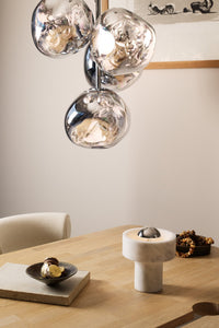 Tom Dixon Melt Mini Chandelier in silver in an official interior view