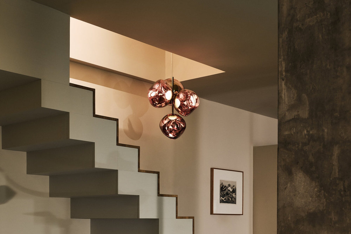 Tom Dixon Melt Mini Chandelier in copper in an official interior setting