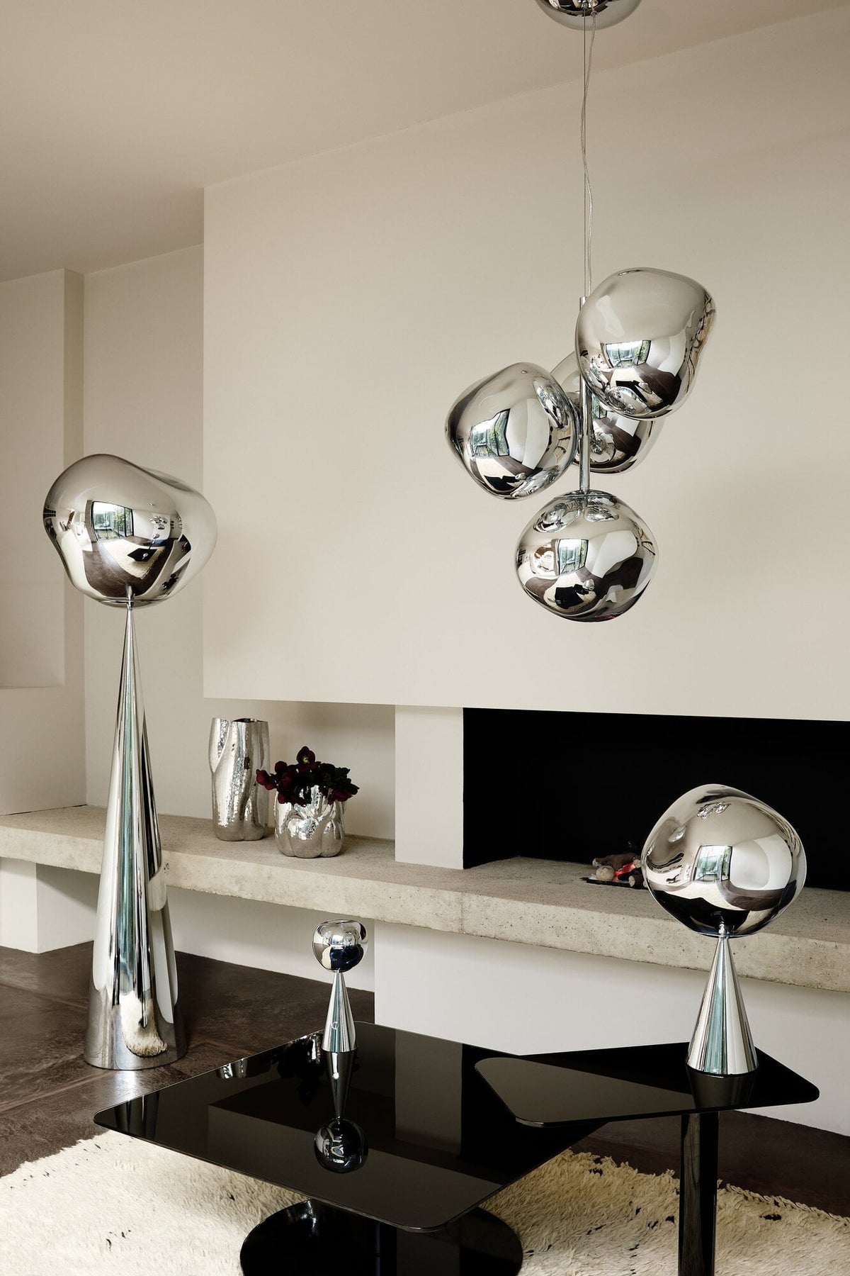 Tom Dixon Melt Mini Chandelier in silver in an official installation view