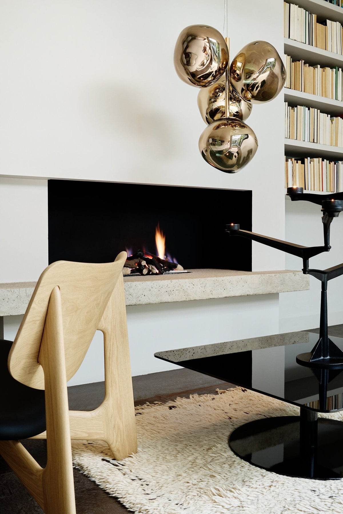 Tom Dixon Melt Mini Chandelier in gold in an official lifestyle installation