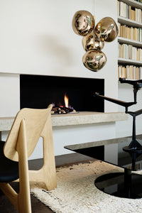 Tom Dixon Melt Mini Chandelier in gold in an official lifestyle installation