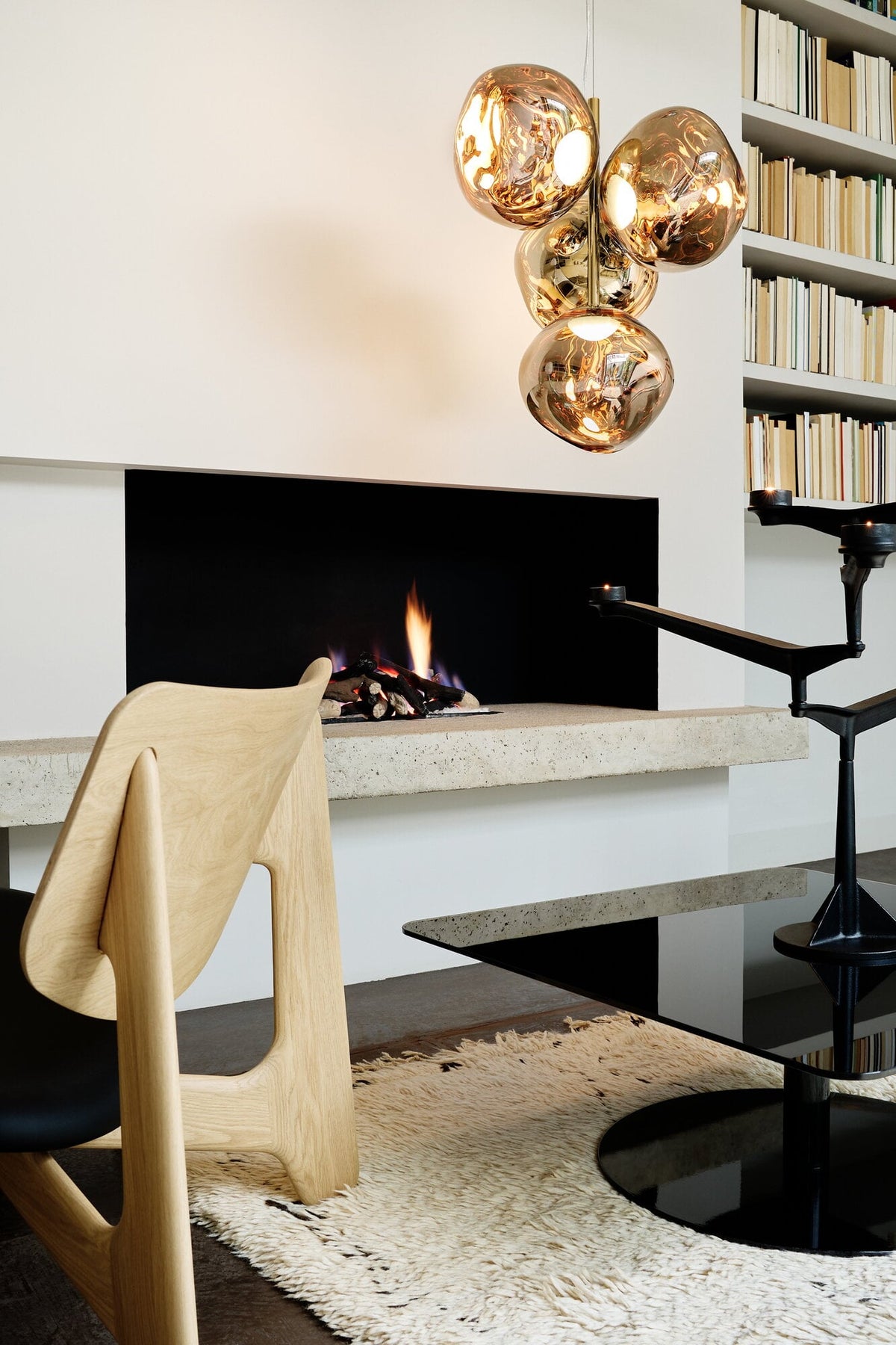 Tom Dixon Melt Mini Chandelier in gold in an official interior setting