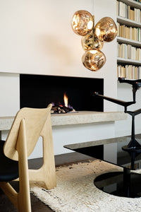 Tom Dixon Melt Mini Chandelier in gold in an official interior setting