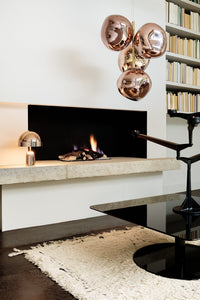 Tom Dixon Melt Mini Chandelier in copper in an official lifestyle installation