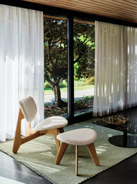 Tom Dixon Slab Ottoman Natural Kvadrat Elle Boucle in an interior setting