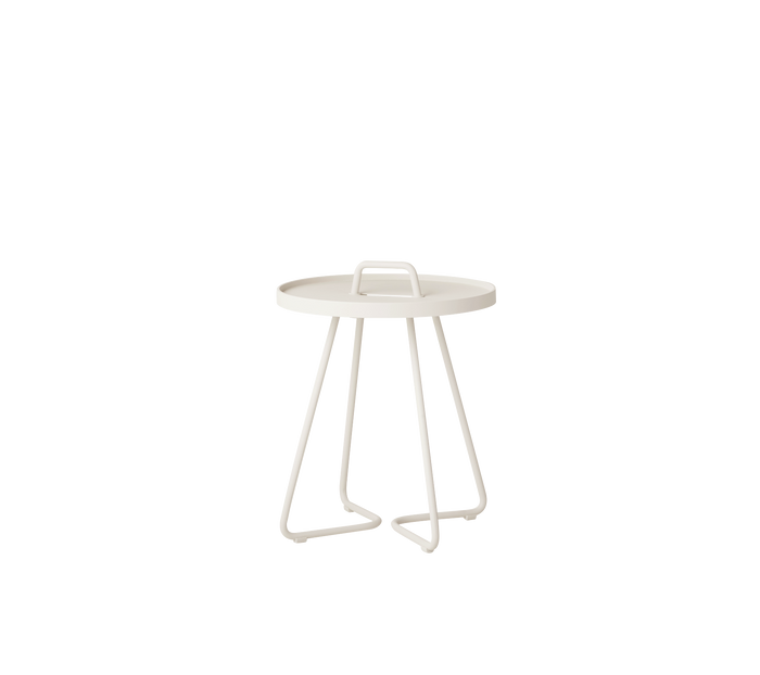 On-the-move mini side table by Cane-line