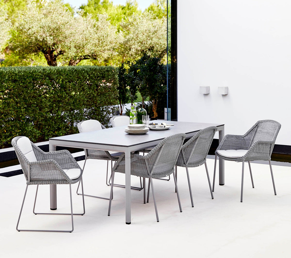 Breeze stackable chair lifestyle image by Cane-line