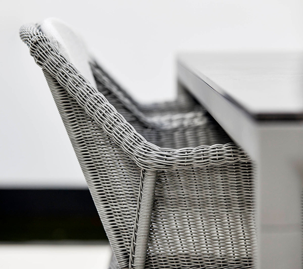 Breeze stackable chair lifestyle image by Cane-line