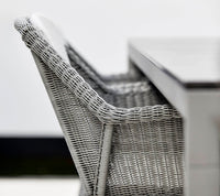 Breeze stackable chair lifestyle image by Cane-line