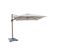 Hyde luxe tilt parasol with granite base by Cane-line