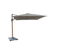 Hyde luxe tilt parasol with granite base by Cane-line