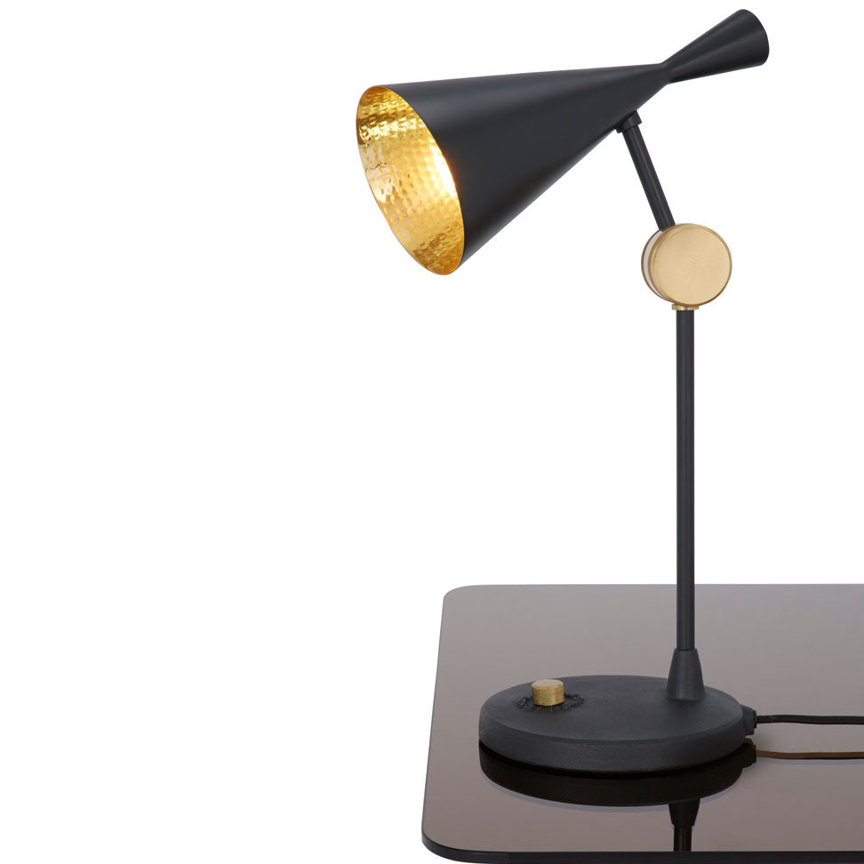 Tom Dixon Beat Table Light in black polished brass, angled view