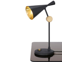 Tom Dixon Beat Table Light in black polished brass, angled view