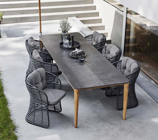 Aspect Dining Table 210x100cm outdoor dining lifestyle with Basket chairs and parasol by Cane-line
