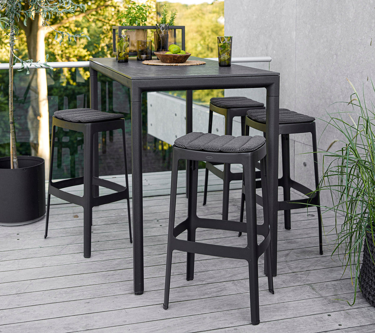 Cut bar table lifestyle image by Cane-line
