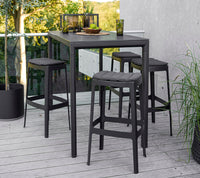 Cut bar table lifestyle image by Cane-line