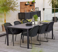 Breeze stackable chair lifestyle image by Cane-line