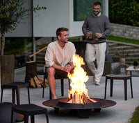 Cut stool lifestyle image by Cane-line