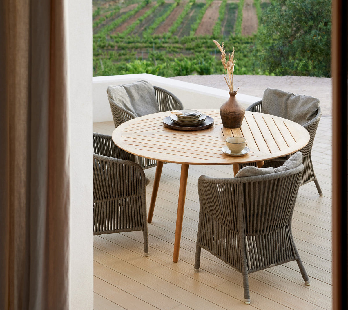 Derby chair with Define dining table by Cane-line