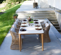 Aspect Dining Table 280x100cm outdoor dining lifestyle with table setting by Cane-line