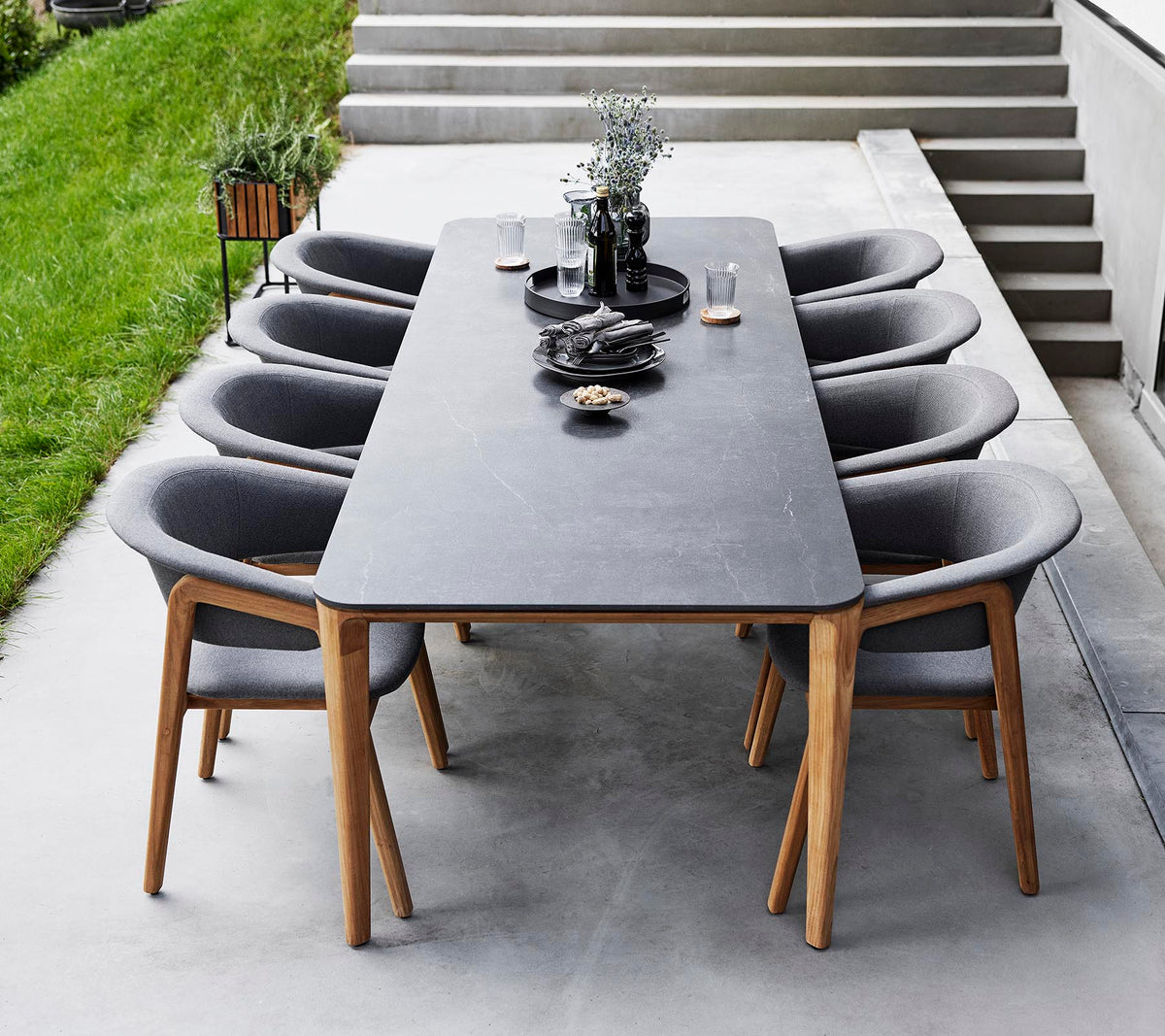 Aspect Dining Table 280x100cm outdoor dining with Luna chair by Cane-line