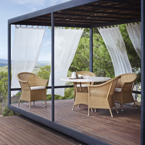 Lansing chair outdoor dining lifestyle image by Cane-line