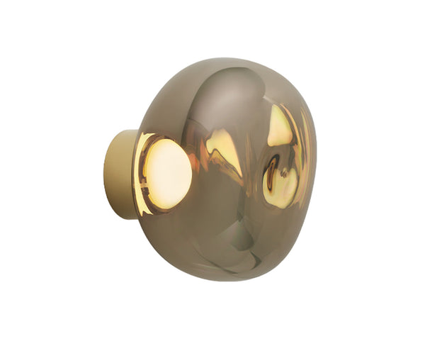 Tom Dixon Melt Mini Surface Light in bronze, diagonal view illuminated