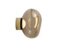Tom Dixon Melt Mini Surface Light in bronze, side view illuminated