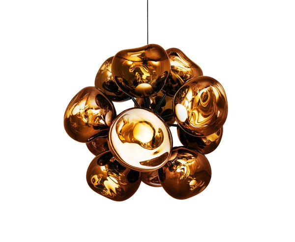Tom Dixon Melt Burst Chandelier in gold, illuminated front view on white