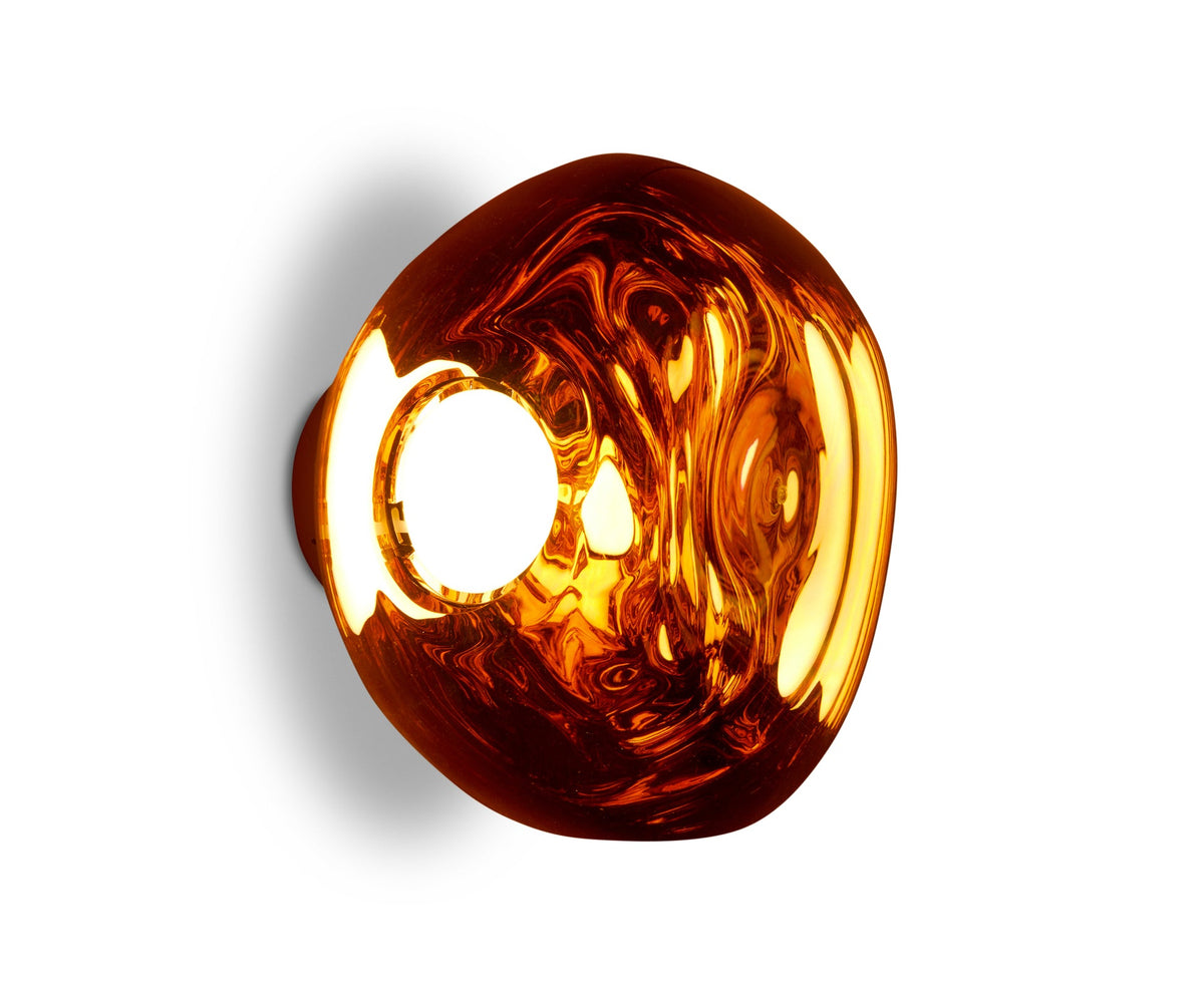 Tom Dixon Melt Mini Surface Light in polished copper, side view illuminated