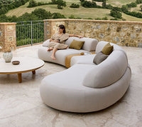 Aspect Coffee Table dia 144cm styled with Mellow sofa outdoor lounge by Cane-line