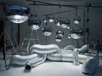 Mirror Ball Floor Chandelier Silver Mirrored Polycarbonate floor light by Tom Dixon in an official interior view