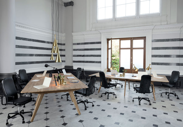 Tom Dixon Slab Desk with Beat lighting in an official interior
