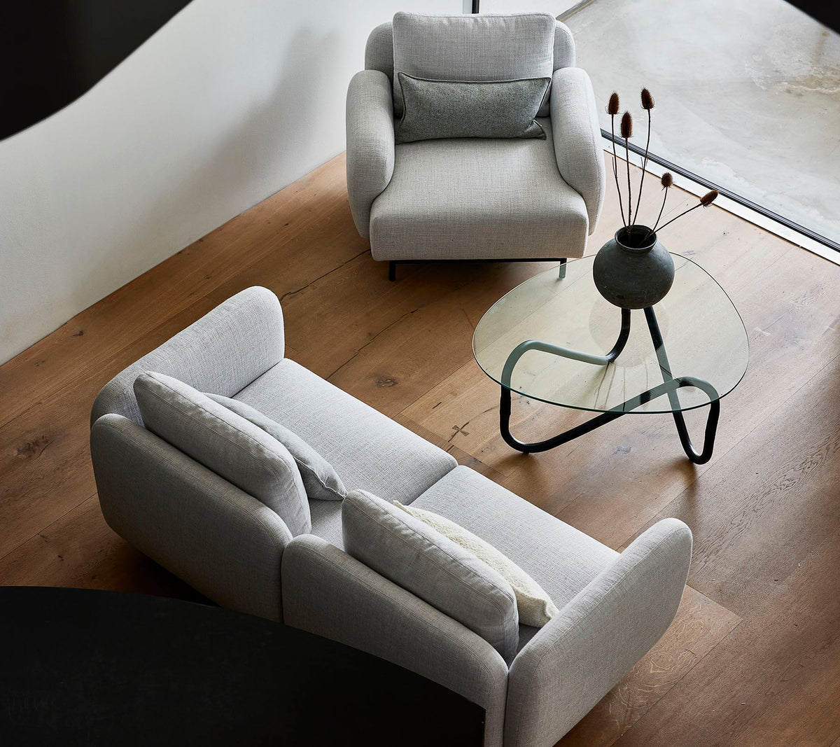 Aura 2-seater sofa lifestyle image by Cane-line, designed by Foersom & Hiort-Lorenzen MDD
