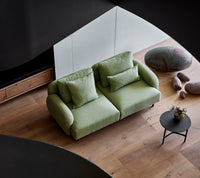 Aura 2-seater sofa lifestyle image by Cane-line, designed by Foersom & Hiort-Lorenzen MDD