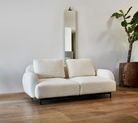 Aura 2-seater sofa lifestyle image by Cane-line, designed by Foersom & Hiort-Lorenzen MDD