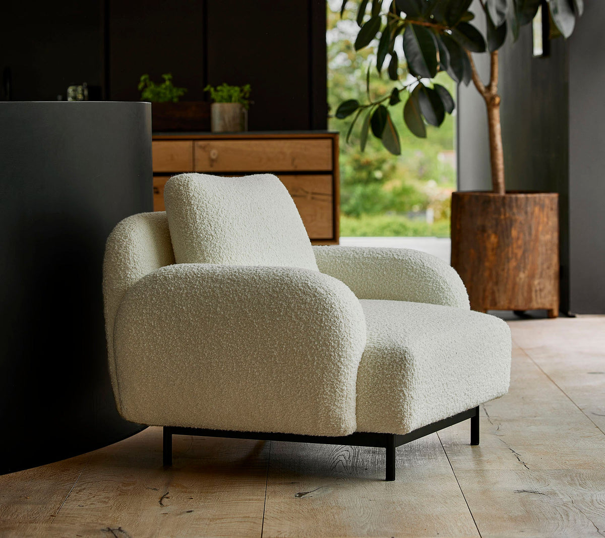 Aura lounge chair lifestyle image by Cane-line, designed by Foersom & Hiort-Lorenzen MDD