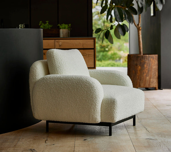 Aura lounge chair lifestyle image by Cane-line, designed by Foersom & Hiort-Lorenzen MDD