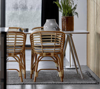 Blend armchair indoor setting by Cane-line, designed by Foersom & Hiort-Lorenzen MDD