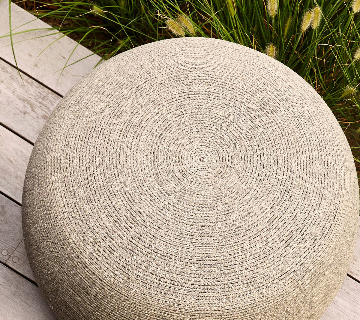 Circle footstool taupe image by Cane-line