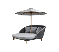 Classic parasol with Peacock daybed lifestyle image by Cane-line