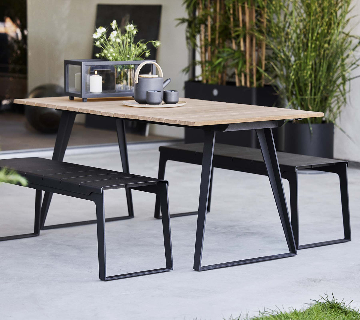 Copenhagen dining table lifestyle image by Cane-line
