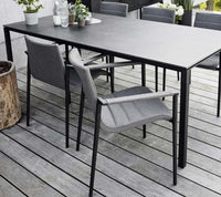 Core Armchair outdoor dining chair by Cane-line, designed by Foersom and Hiort-Lorenzen MDD