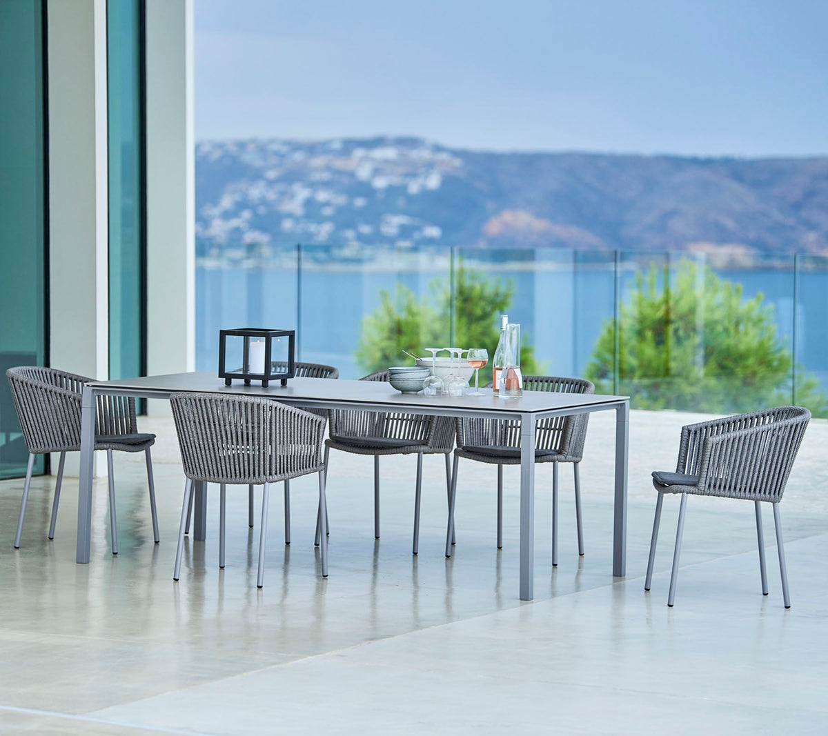 Cane-line Moments outdoor dining setup lifestyle image
