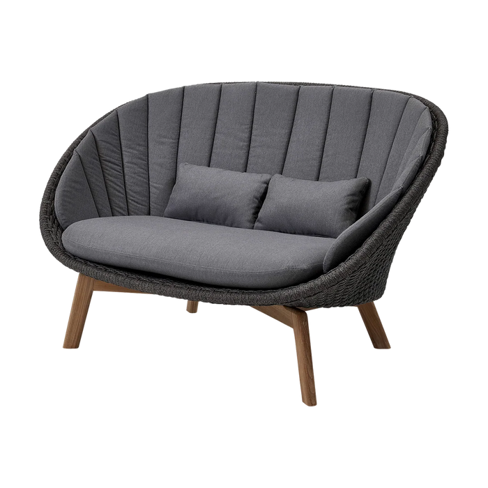 Peacock 2-seater sofa by Cane-line, designed by Foersom & Hiort-Lorenzen MDD